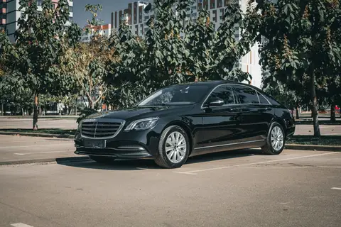 Black Mercedes-Benz S-Class sedan